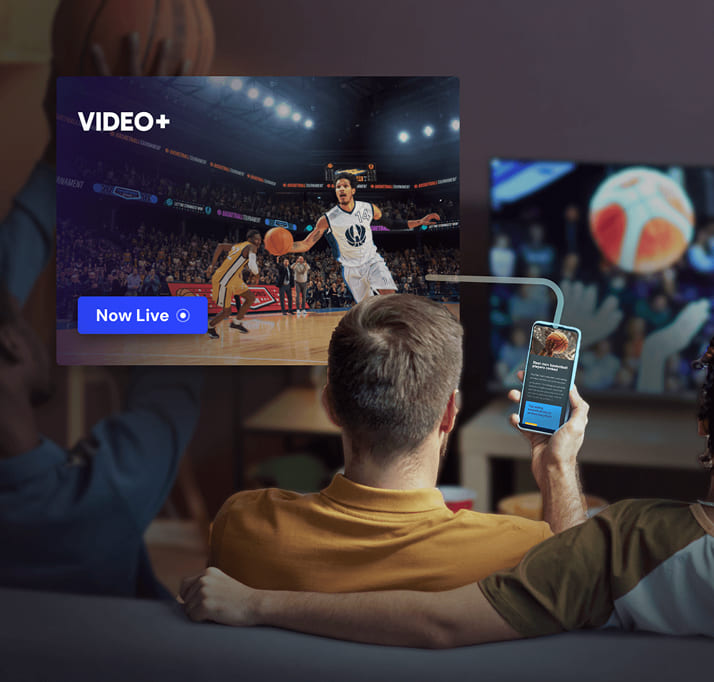 Person on couch sees ad for basketball streaming service while reading basketball content on mobile